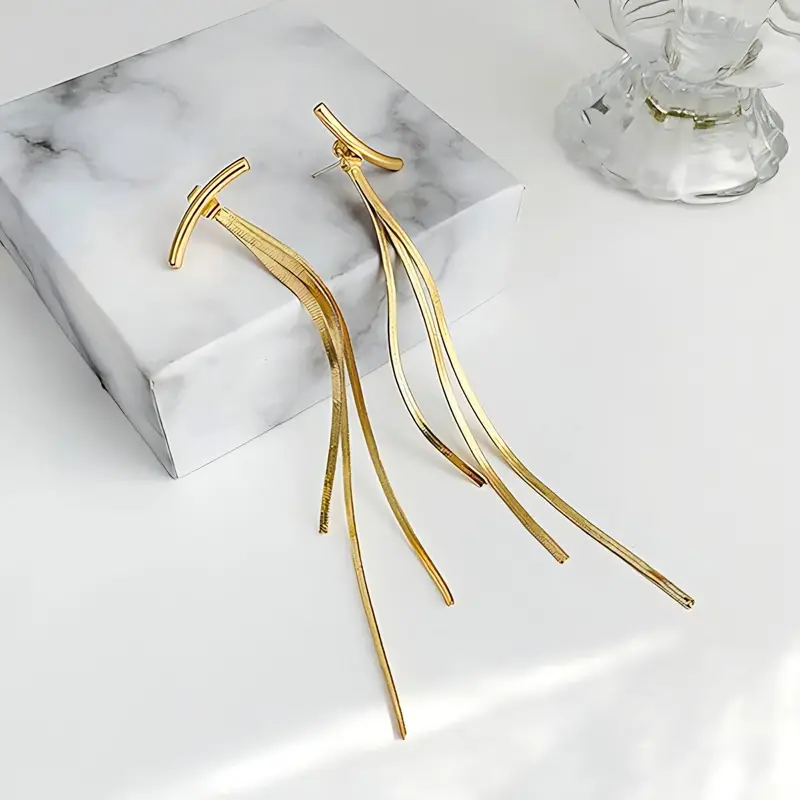 Pendientes largos con borla