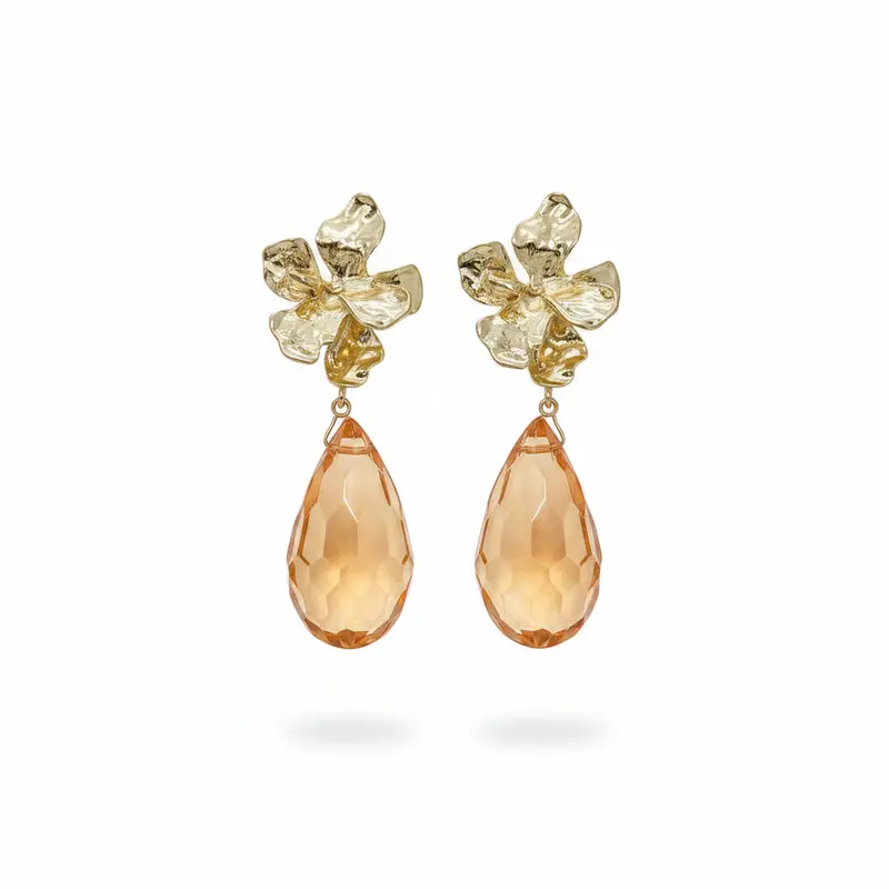 Pendientes largos con flor dorada y lágrima de cristal colgante en varios colores