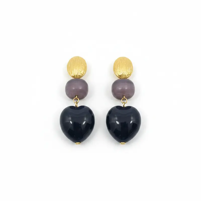 Pendientes largos de acero de diferentes formas y texturas en negro y oro