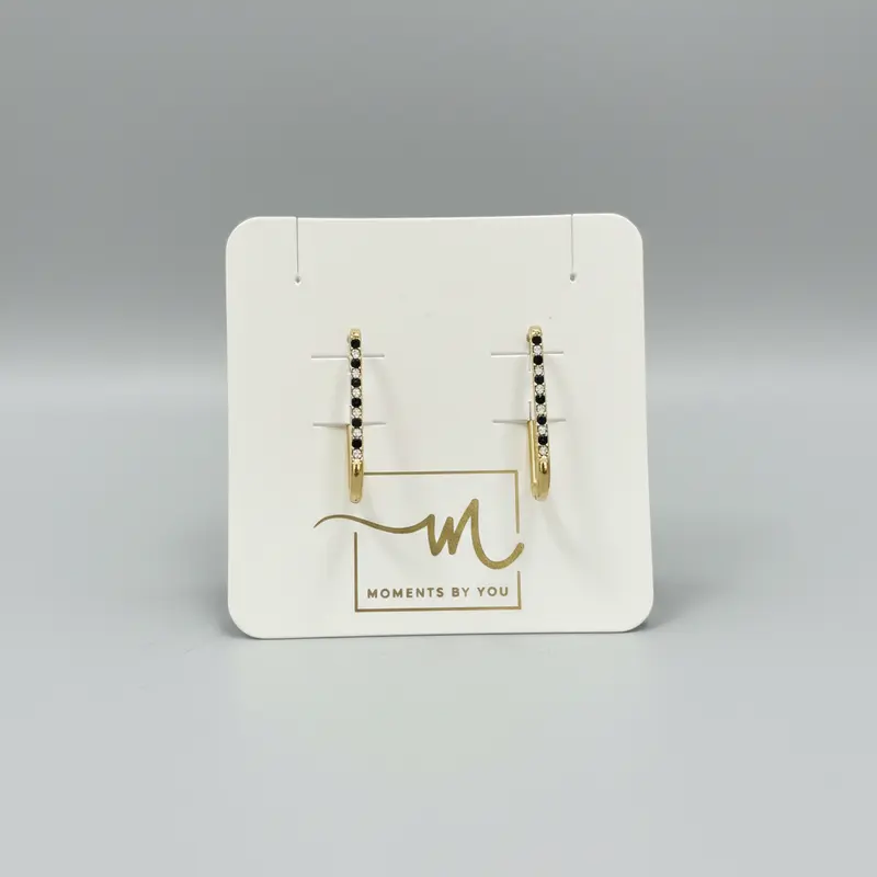 Pendientes largos de eslabones con circonitas y acabado oro