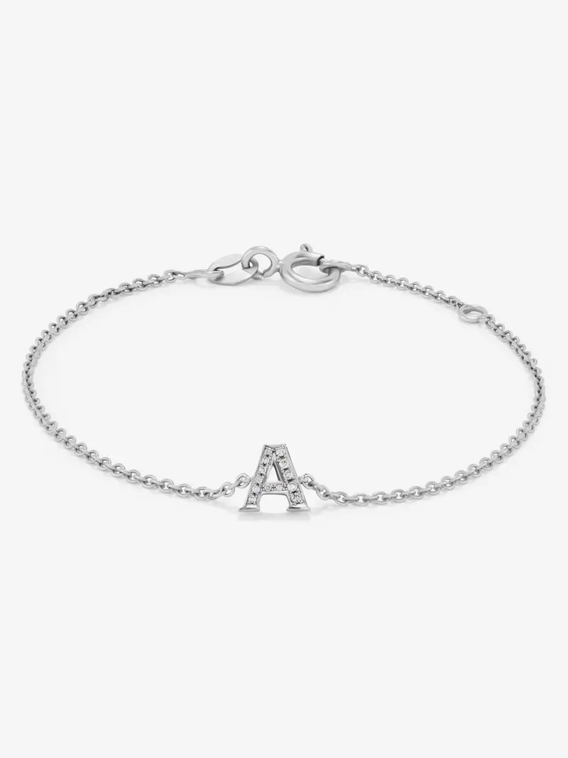 Pulsera cadena con inicial de oro blanco de 18K y diamantes