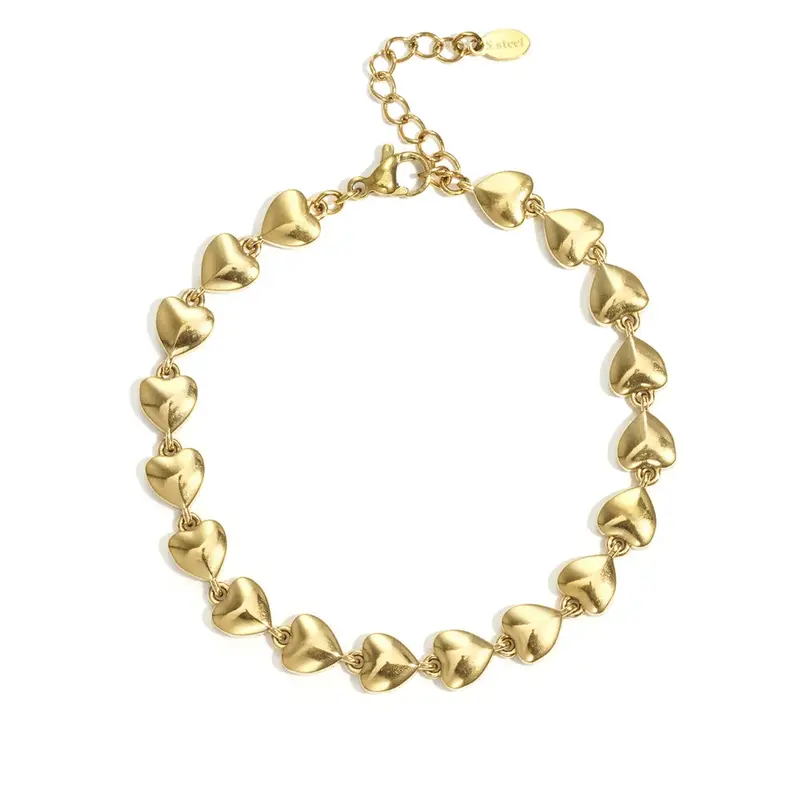 Pulsera de acero con corazones alineados acabado oro
