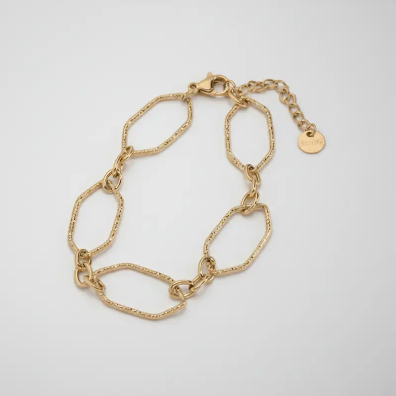 Pulsera de acero fina de formas geométricas con textura rugosa acabado oro