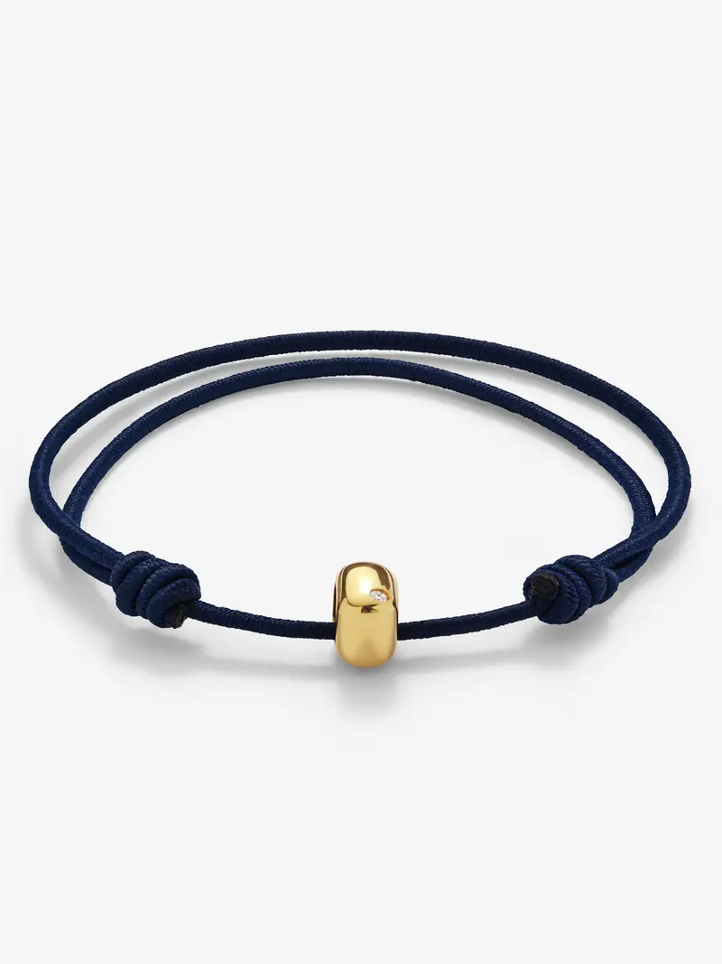 Pulsera de oro amarillo de 18K con 2 diamantes en talla brillante con un total de 0,03 cts