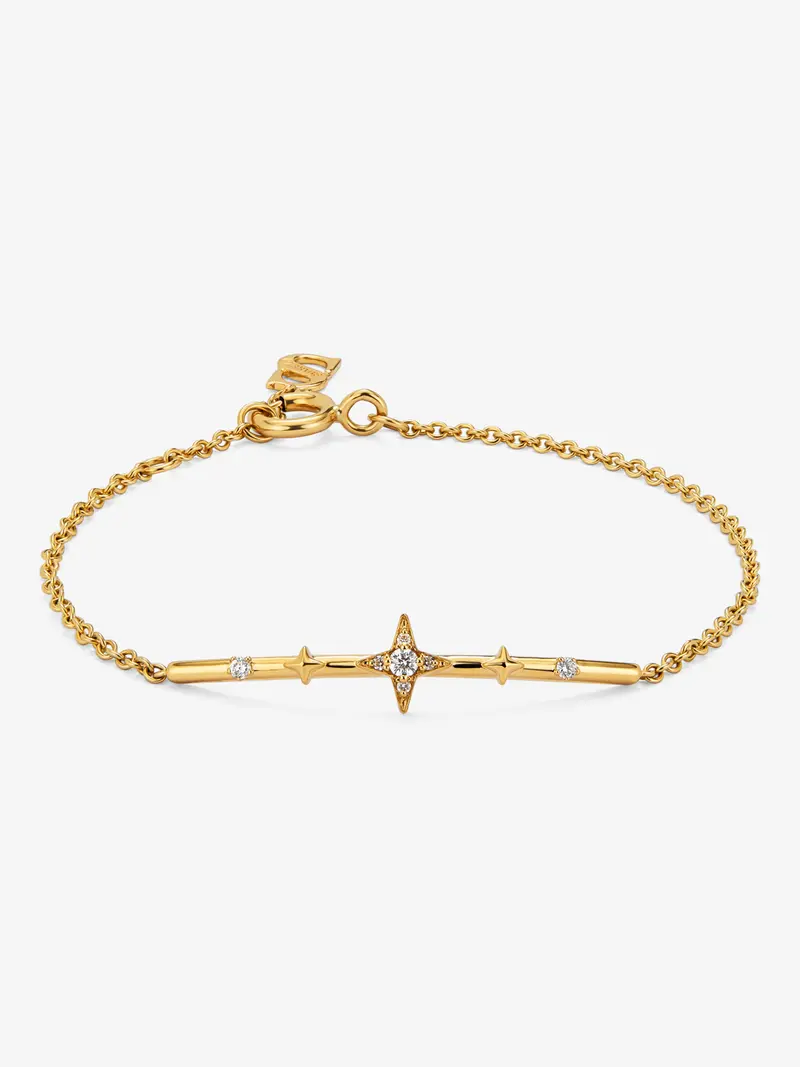 Pulsera de oro amarillo de 18K con 7 diamantes en talla brillante con un total de 0,08 cts