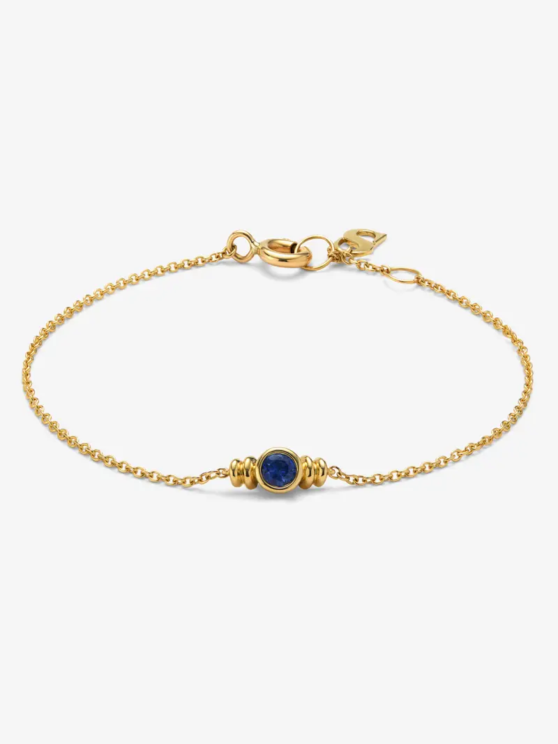 Pulsera de oro amarillo de 18K con zafiro en talla brillante de 0,1 cts