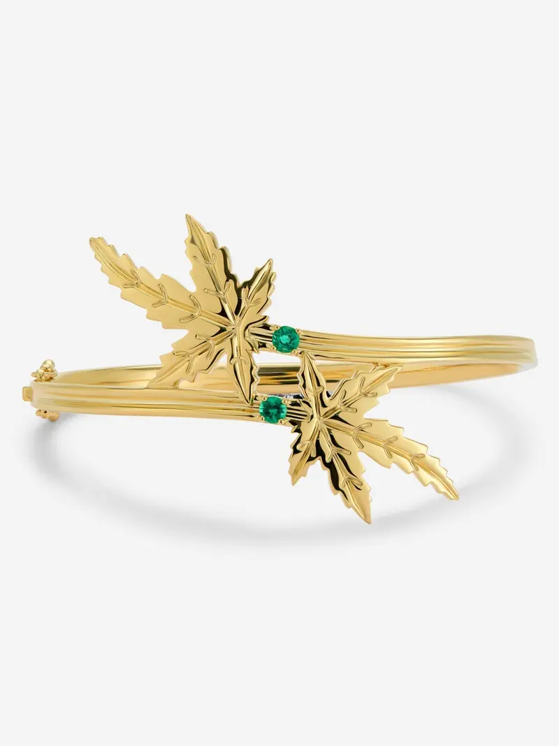 Pulsera de oro amarillo de 18K y esmeralda en talla brillante con un total de 0,23 cts