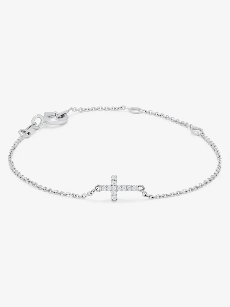 Pulsera de oro blanco de 18K con 11 diamantes en talla brillante con un total de 0,04 cts y cruz