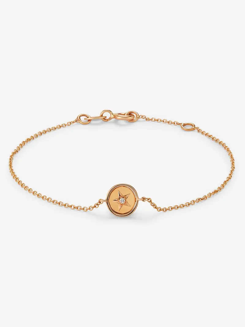 Pulsera de oro rosa de 18K con forma de estrella y diamante en talla brillante de 0,01 cts