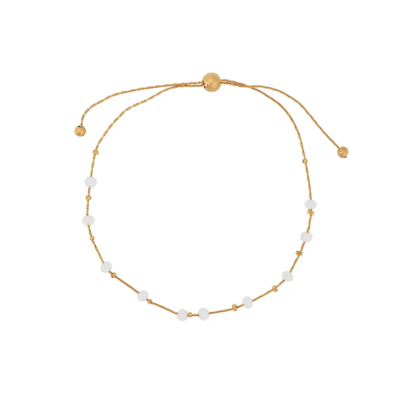 Pulsera fina de acero inoxidable con piedras de color blanco y ajustable acabada oro - mbyou