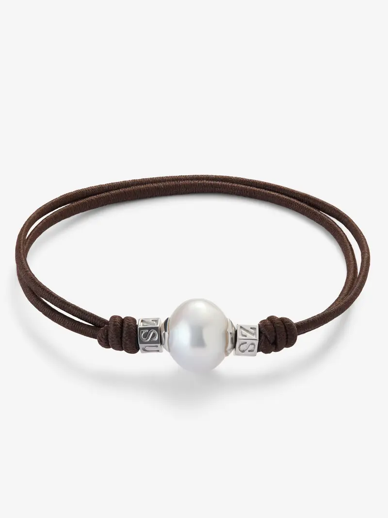 Pulsera one con perla australiana y detalles de plata 925