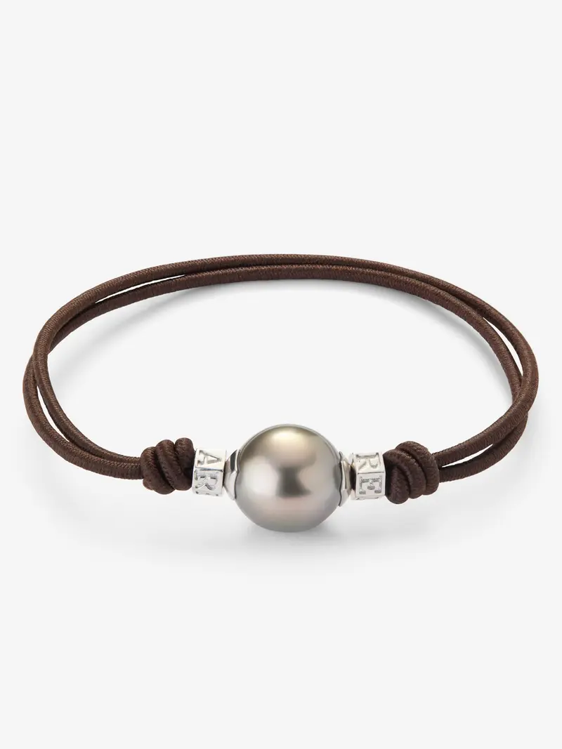 Pulsera one con perla tahití y detalles de plata 925