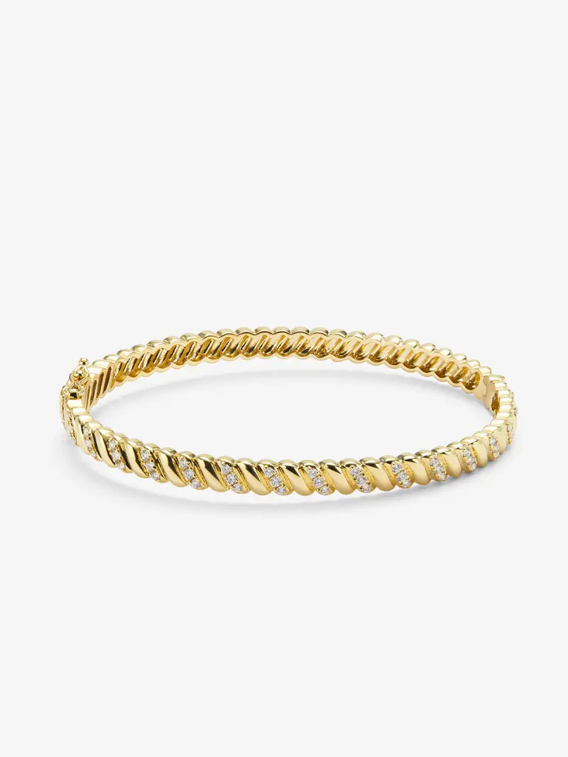 Pulsera rígida de oro amarillo de 18K con diamantes blancos en talla brillante de 0,58 cts