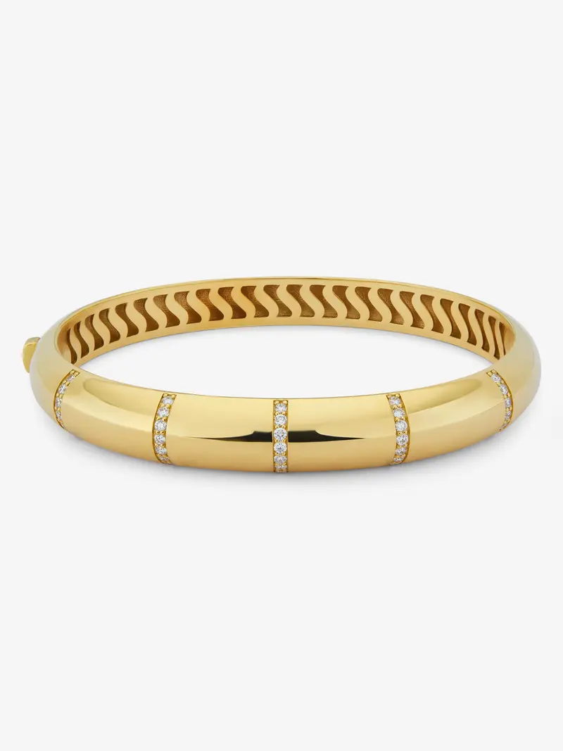 Pulsera rígida de oro amarillo de 18K con pavé de diamantes en talla brillante