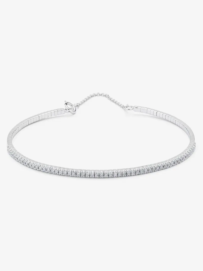 Pulsera rígida de oro blanco de 18K con diamantes blancos en talla brillante de 0,39 cts
