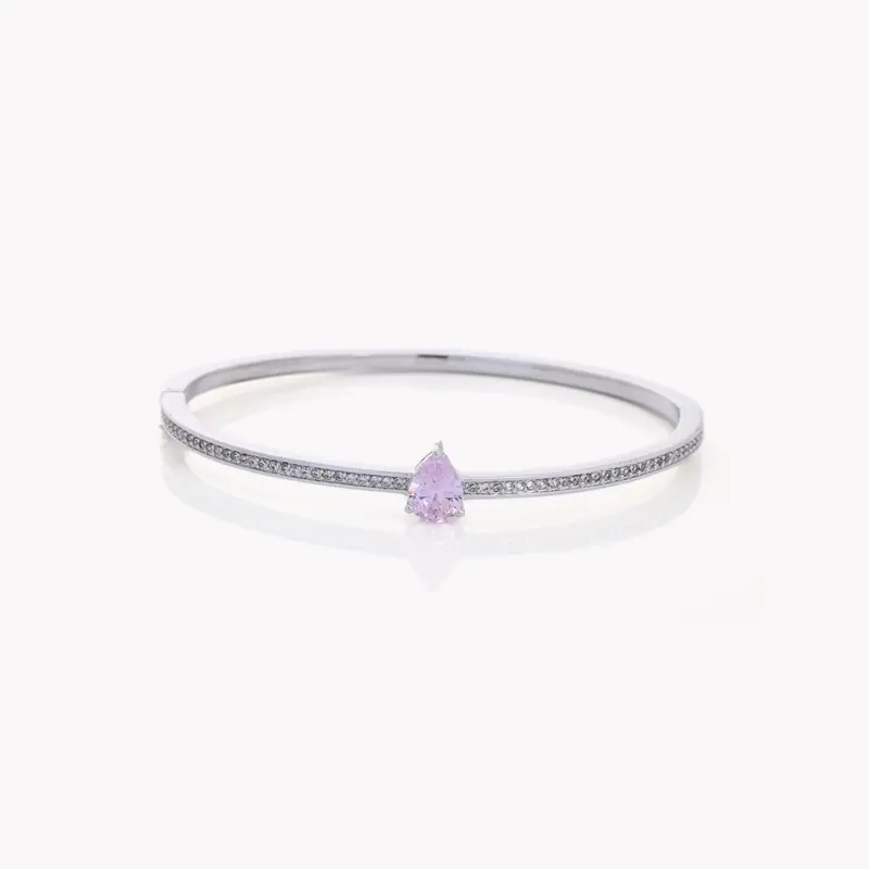 Pulsera rígida semijoya con circonitas y piedra oval rosa