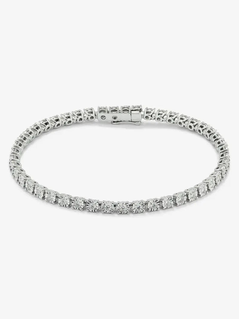 Pulsera rivière de oro blanco de 18K con diamantes en talla brillante con un total de 0,89 cts