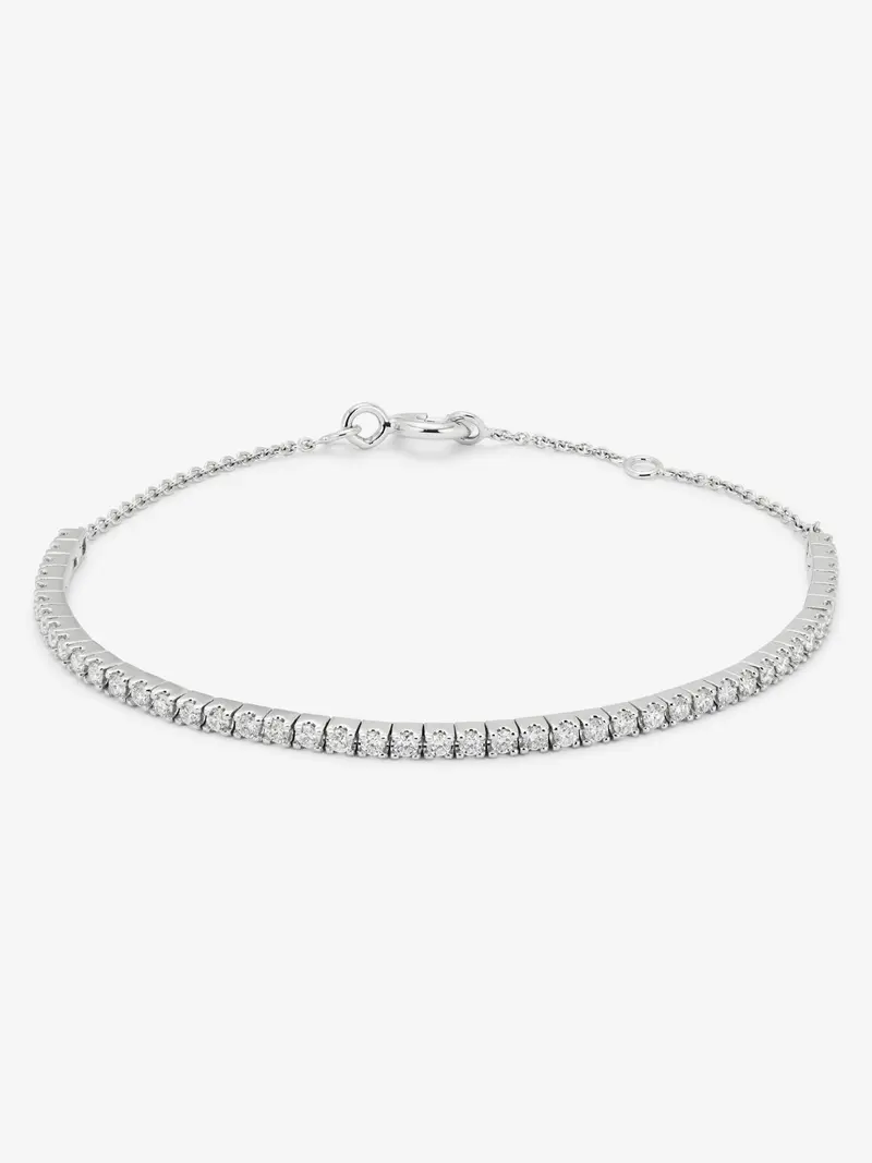 Pulsera rivière de oro blanco de 18K con diamantes en talla brillante con un total de 0,90 cts