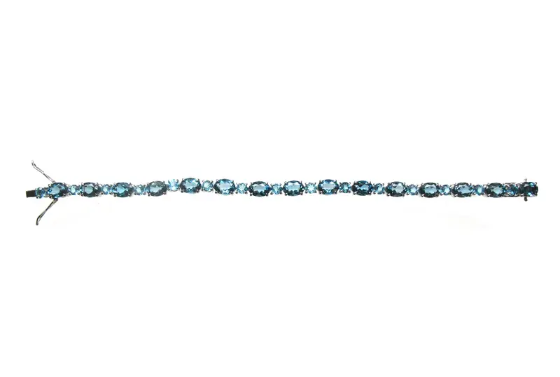 Pulsera rivière de plata 925 con topacios azul london y azul swiss