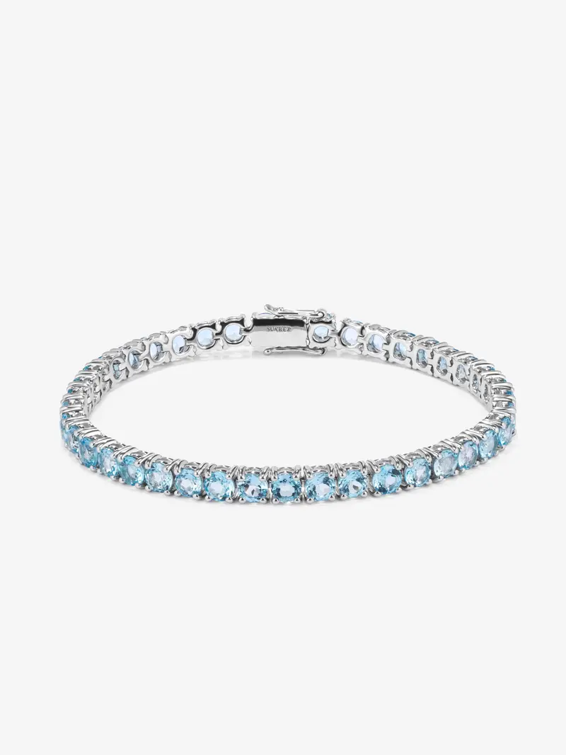 Pulsera riviere de plata 925 con topacios azul swiss en talla brillante con un total de 11,4 cts