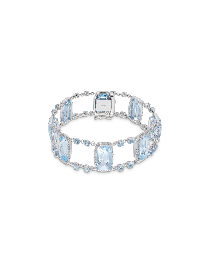 Pulsera Victoria topacios azules y diamantes, oro blanco